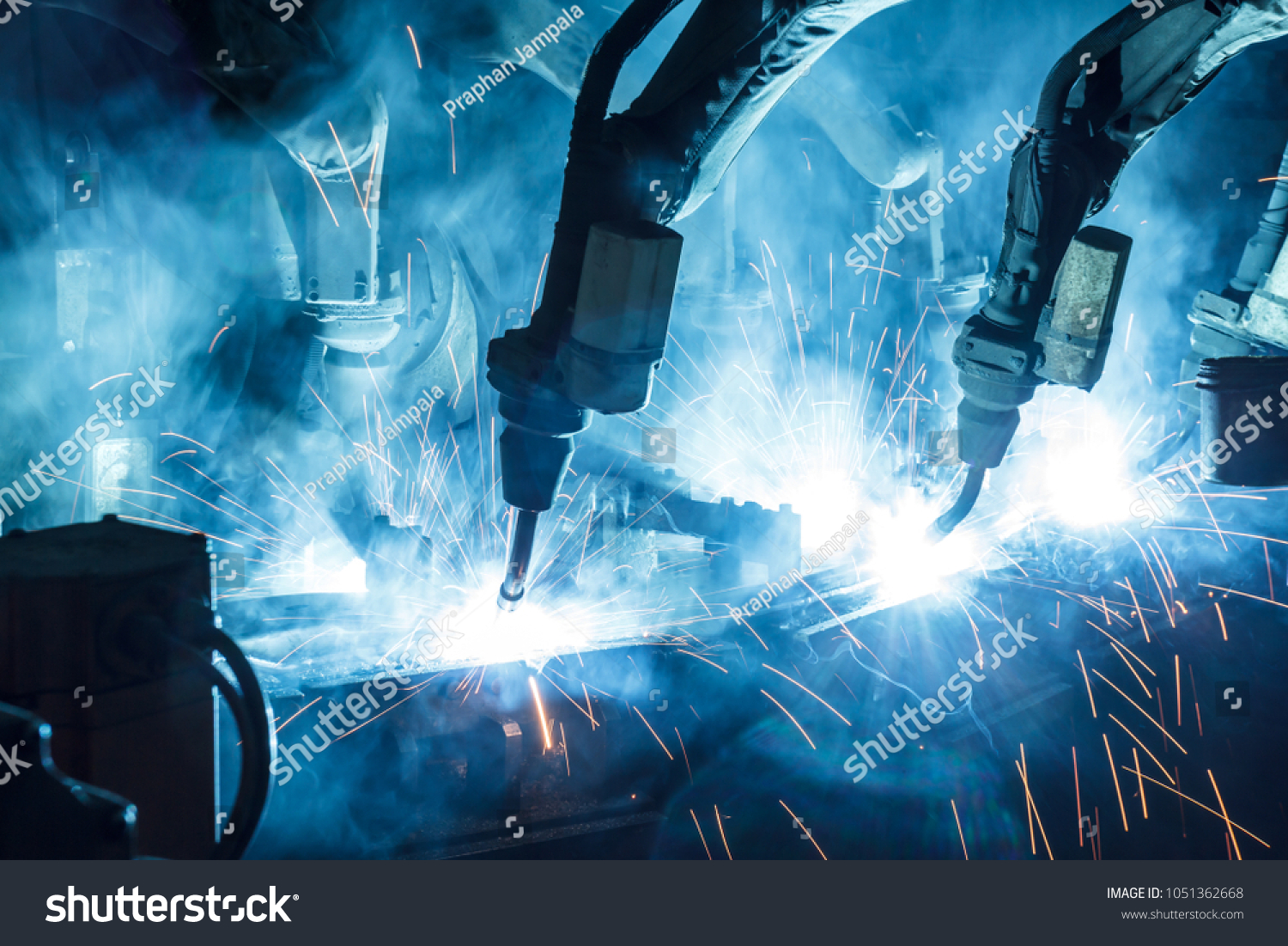 Auto stock photo the movement of the robot welding in an auto parts factory 1051362668 - business consulting1